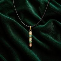 Crackled glass and Amazonite Pendant and earring Gold