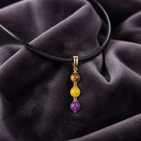 Catseye and purple crackled glass citrine chip Pendant and Earring Gold