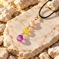 Catseye and purple crackled glass citrine chip Pendant and Earring Gold