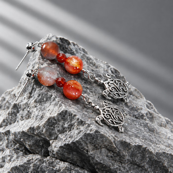 Earrings: Carnelian and orange cats eye and dyed glass